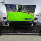 طاولة تلفاز مع عازل زجاجي  تلفاز 55بوصه 2ابوجوره