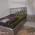 غرفة نوم مع فرن غاز