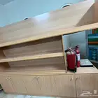 سير كهربائي ودولاب خشب جديده