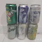علب قديمة لمشروبات غازية