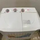 غسالة ملابس صغيرة