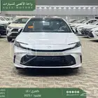 تويوتا كامري LE فتحة بانوراما ابيض هايبرد 2025 اقل سعر
