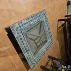 منقل ساكو مربع مزين بقطع رخامية