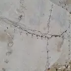 معلم حجر وتخريم الصخور وحفر الاراضي وبناء جدار الحجر