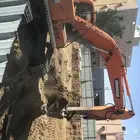 حفر الارض وتسويتها وقص الجبل وهدم مباني
