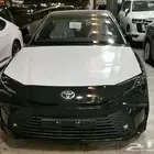 كامري LE هايبرد أسود وفضي وتيتانيوم سعودي 2025