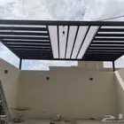 مظلات وسواتر سندويش بنل مستودعات لكسان برجولات شكل خشبي