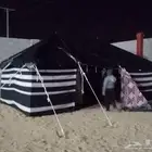 بيت شعر لون ابيض ولون اسود