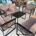 طقم كراسي خشب وحديد خارجية