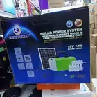 جهاز منظومة طاقه شمسية مع 4 لمبات وشواحن جوال