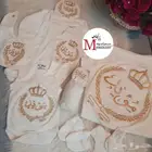 مجموعة أطقم مواليد بالاسم