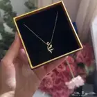 سلسال نسائي حرفين مطلي ذهب عيار 21