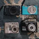 كاميرا ديجيتال نيكون و سامسونج زي الجديد