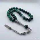 سبحة مميزة من التايجر الاخضر مطعمة فضة