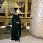 فستان الأخضر الزيتي طويل و أنيق فساتين تتميز بتصميمها الفريد