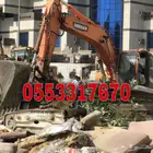 بوكلين وتريلات لهدم وازالة المباني القديمه في مكه