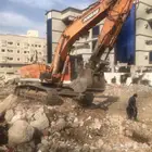 بوكلين هدم حفر دفن قص الارض باليوميه او قطوعه بمكه