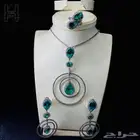 طقم فضة (Silver) عيار 925 إسترليني بأحجار زمرد أخضر وزركون