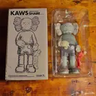 تحفة دمية كاوس kaws