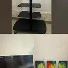 تلفزيون وطاولة ولوحة