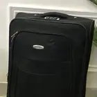 شنطة سفر سوداء