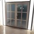 الا لمونيوم سرايا عادي باب وشباك مح زجاج دبل