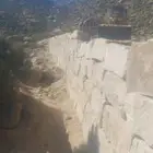 مقاول بناء الحجر وقص وتسوية الاراضي