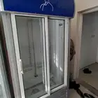 ثلاجة باب والثانية بابين على الشرط