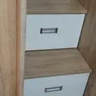 Two IKEA storage beds with cupboard study table  and drawers