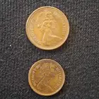 عملة بريطانية من 1971 الملكة اليزابيث 2 و عملة امريكية 1961