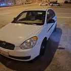 اكسن 2010 للبيع قير اتوماتيك اللون ابيض بنزين ممشى 290 مشي ح