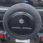 جمني سوزوكي غطاء اسبير خلفي اسود اصلي وكاله