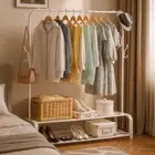 حمالة ملابس معدنية مع تخزين سفلي