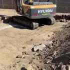 حفر اراضي وترحل بوكلين للايجار