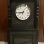 ساعة أنتيك خشب ملبسه نحاس من الأطراف