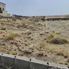 أرض مستوية عزاز بالضاحية خميس مشيط مساحتها900م مقابل الوسام