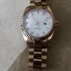 ساعه اتوماتيك نظيفه وجديده مابه شي لون نحاسي