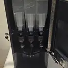 الة كوفي جديدة بقراطيسه