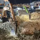 معدات حفر وترحيل قطع ردم بوكلين
