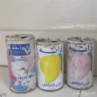 علب مشروبات دانه و الواحه تقريبا عمرها 31 سنه الشعار