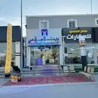 بوابة افتتاح المحلات ليزر ستي كلر بالون فرشه خزامي