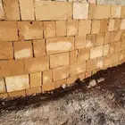 نعمل في مجال التراث الشعبي الحجر الطبيعي الخشب والجراد