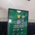 تي شيرت اهلي للبيع مع توقيع اللاعبين ع السوم