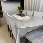 طاوله قزاز مع سبع كراسي من الخشب