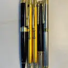 ساعات و أقلام مستعمله