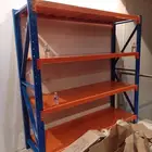 رفوف تخزين مستوعات