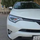 تويوتا راف فور أبيض لؤلؤي فل كامل(فل الفل)