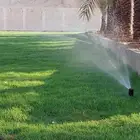 تركيب شبكات الري والعشب الطبيعي