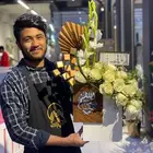 (Floral designer) (مصمم الزهور)