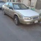 كامري 2000 نضيف محركاته علا الشرط الممشى 400الجنوط كروم علا